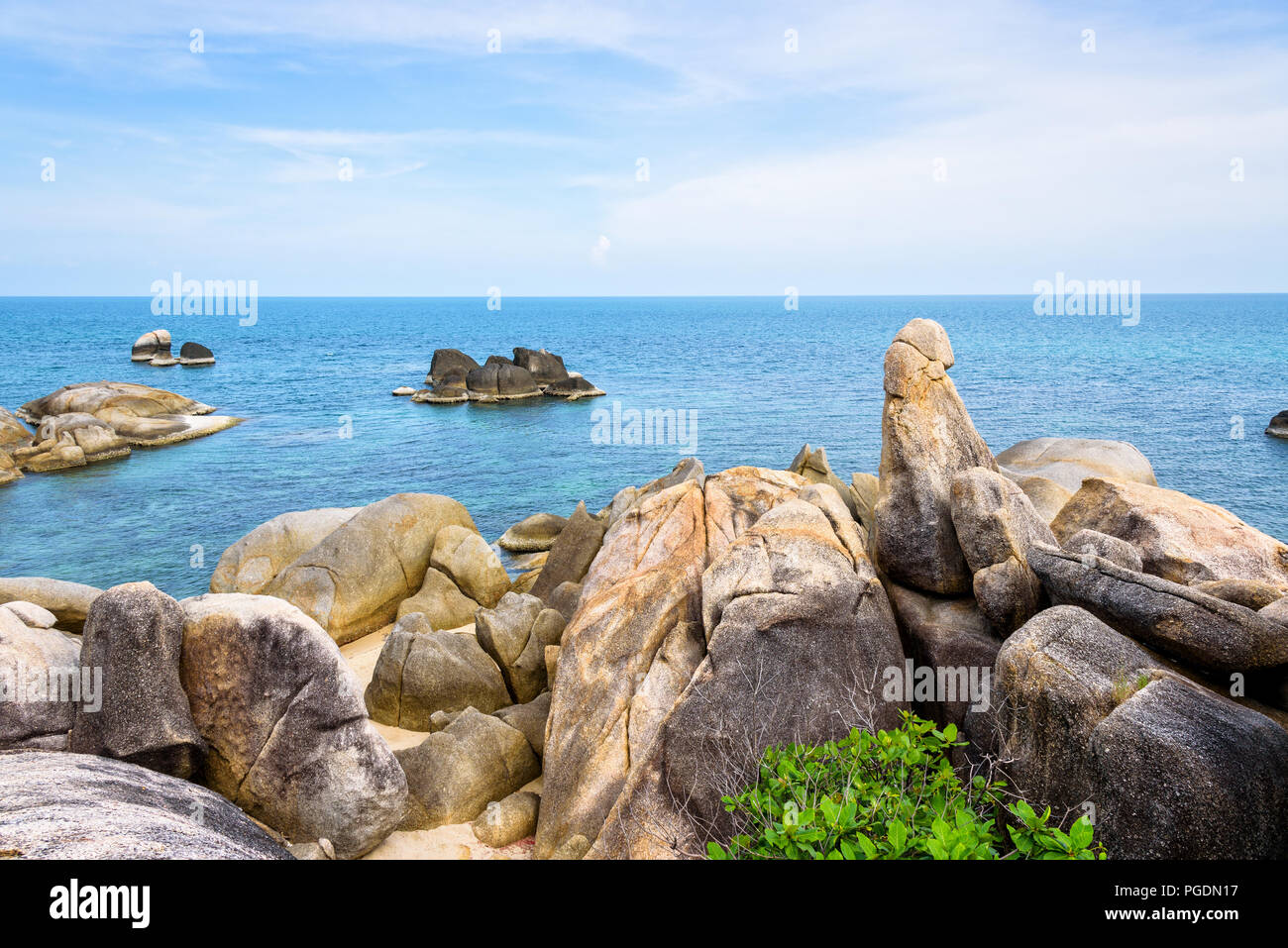 Hin Ta Hin Yai is a symbol famous tourist destinations, Beautiful rock coastline near the blue sea under the summer sky at Lamai beach of Koh Samui is Stock Photo