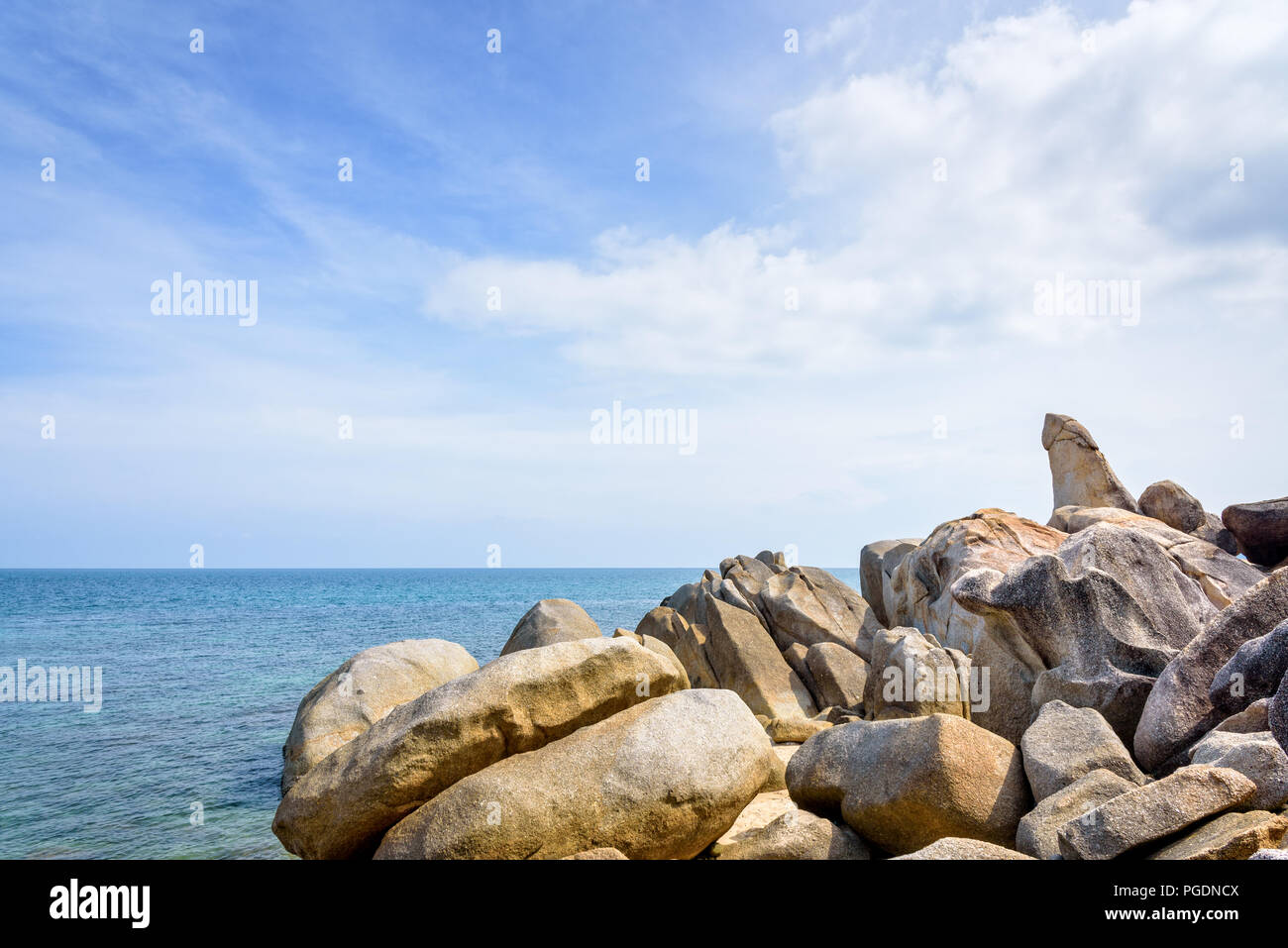 Hin Ta Hin Yai is a symbol famous tourist destinations, Beautiful rock coastline near the blue sea under the summer sky at Lamai beach of Koh Samui is Stock Photo