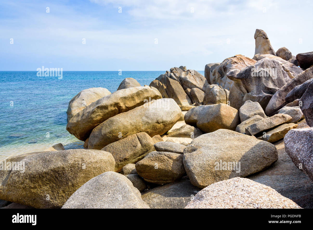 Hin Ta Hin Yai is a symbol famous tourist destinations, Beautiful rock coastline near the blue sea under the summer sky at Lamai beach of Koh Samui is Stock Photo