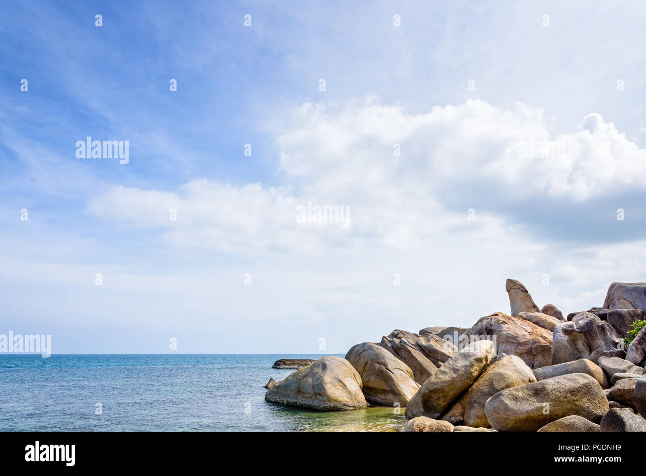 Hin Ta Hin Yai is a symbol famous tourist destinations, Beautiful rock coastline near the blue sea under the summer sky at Lamai beach of Koh Samui is Stock Photo