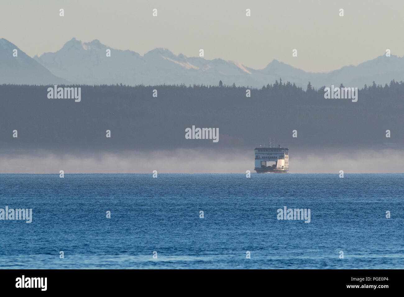 Puget Sound ferry with Cascade mountains in background. Washington State ferries. Port Townsend