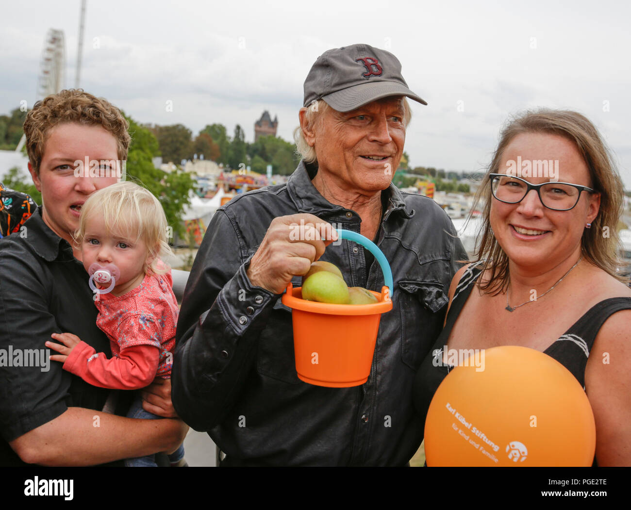 Worms, Germany. 24th Aug, 2018. Terence Hill and members of the Karl-Kubel-Foundation are pictured on the bridge. Italian actor Terence Hill visited the German city of Worms, to present his new movie (My Name is somebody). Terence Hill added the stop in Worms to his movie promotion tour in Germany, to visit a pedestrian bridge, that is unofficially named Terence-Hill-Bridge (officially Karl-Kubel-Bridge). Credit: Michael Debets/Pacific Press/Alamy Live News Stock Photo