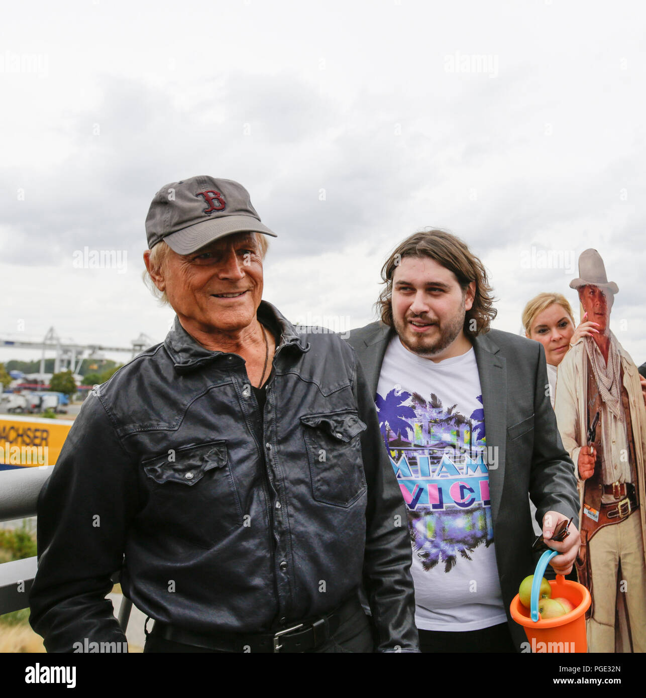 Worms, Germany. 24th Aug, 2018. Terence Hill (left) and actor Peter Englert (right), who initiated the renaming of the bridge to Terence-Hill-Bridge, are pictured on the bridge. Italian actor Terence Hill visited the German city of Worms, to present his new movie (My Name is somebody). Terence Hill added the stop in Worms to his movie promotion tour in Germany, to visit a pedestrian bridge, that is unofficially named Terence-Hill-Bridge (officially Karl-Kubel-Bridge). Credit: Michael Debets/Pacific Press/Alamy Live News Stock Photo