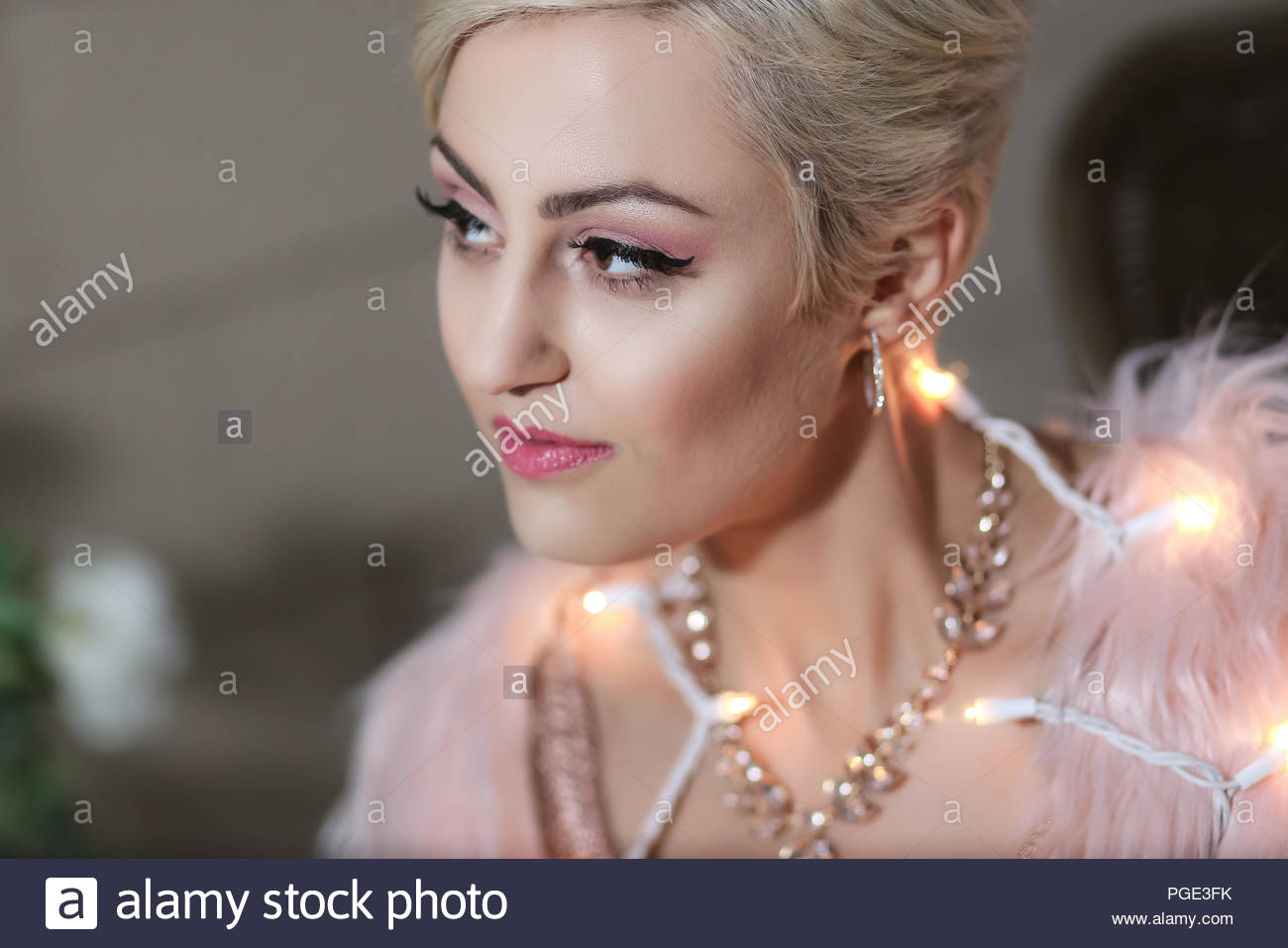 Young Woman With Short Hair And Holiday Theme Stock Photo