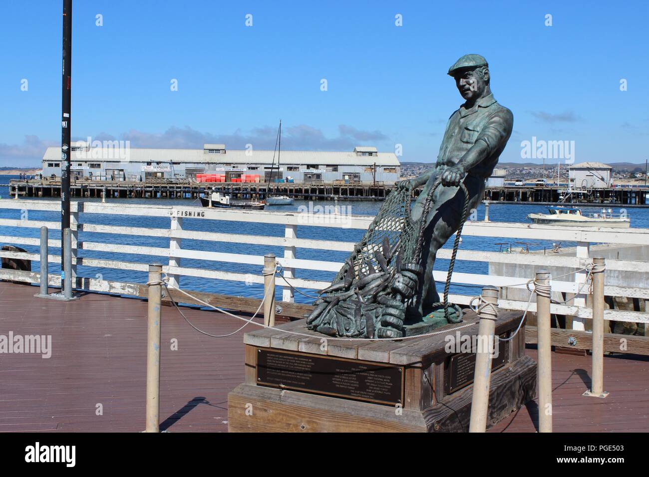 The Fisherman by Artist Jesse Corsaut on Old Fisherman's Wharf, Monterey, California, USA Stock Photo