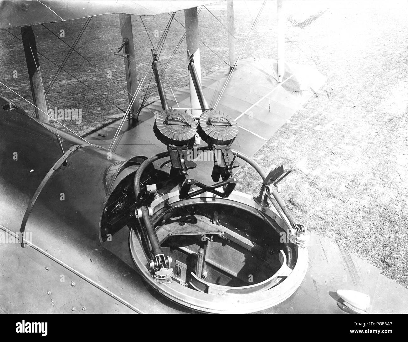 View of De Haviland plane from left rear quarter, looking into gunner's cockpit. Twin mounting of Lewis guns. Venturi air speed gauge mounted on wing strut 1918 Stock Photo
