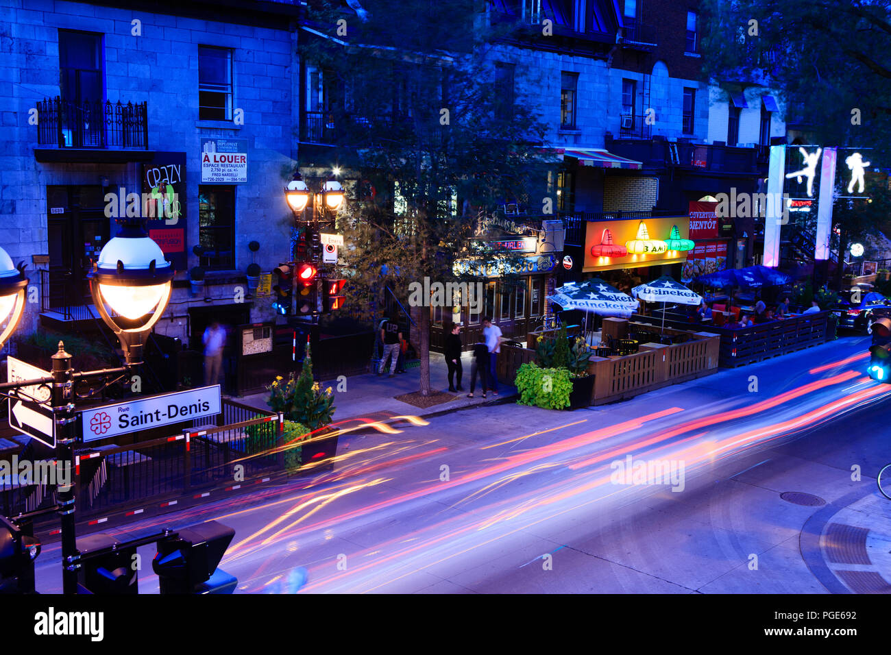 Montreal, Canada -   Saint Denis street at night in Montreal's Plateau Mont Royal in Quebec Stock Photo