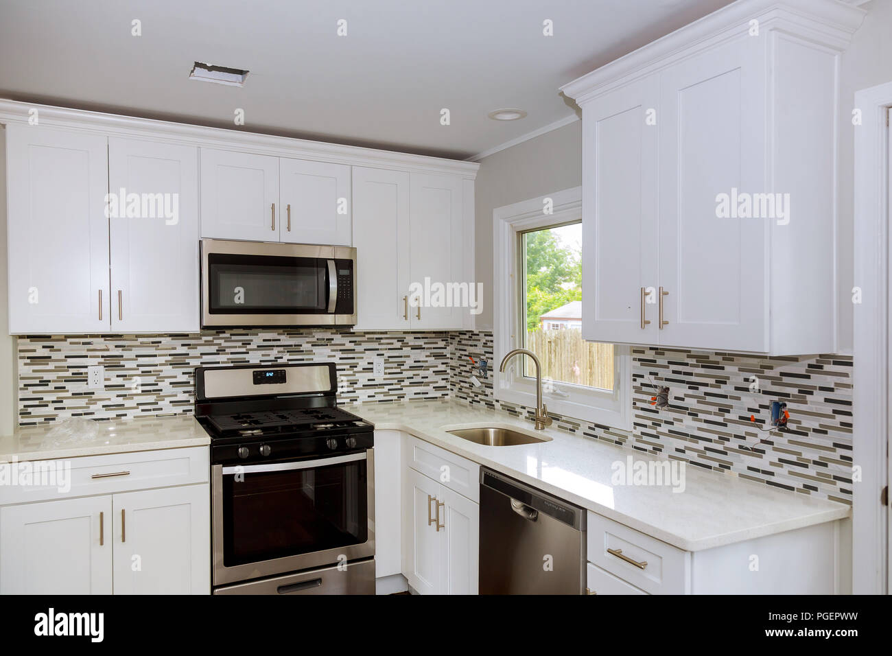 Open Kitchen Area new modern kitchen with stainless steel appliances