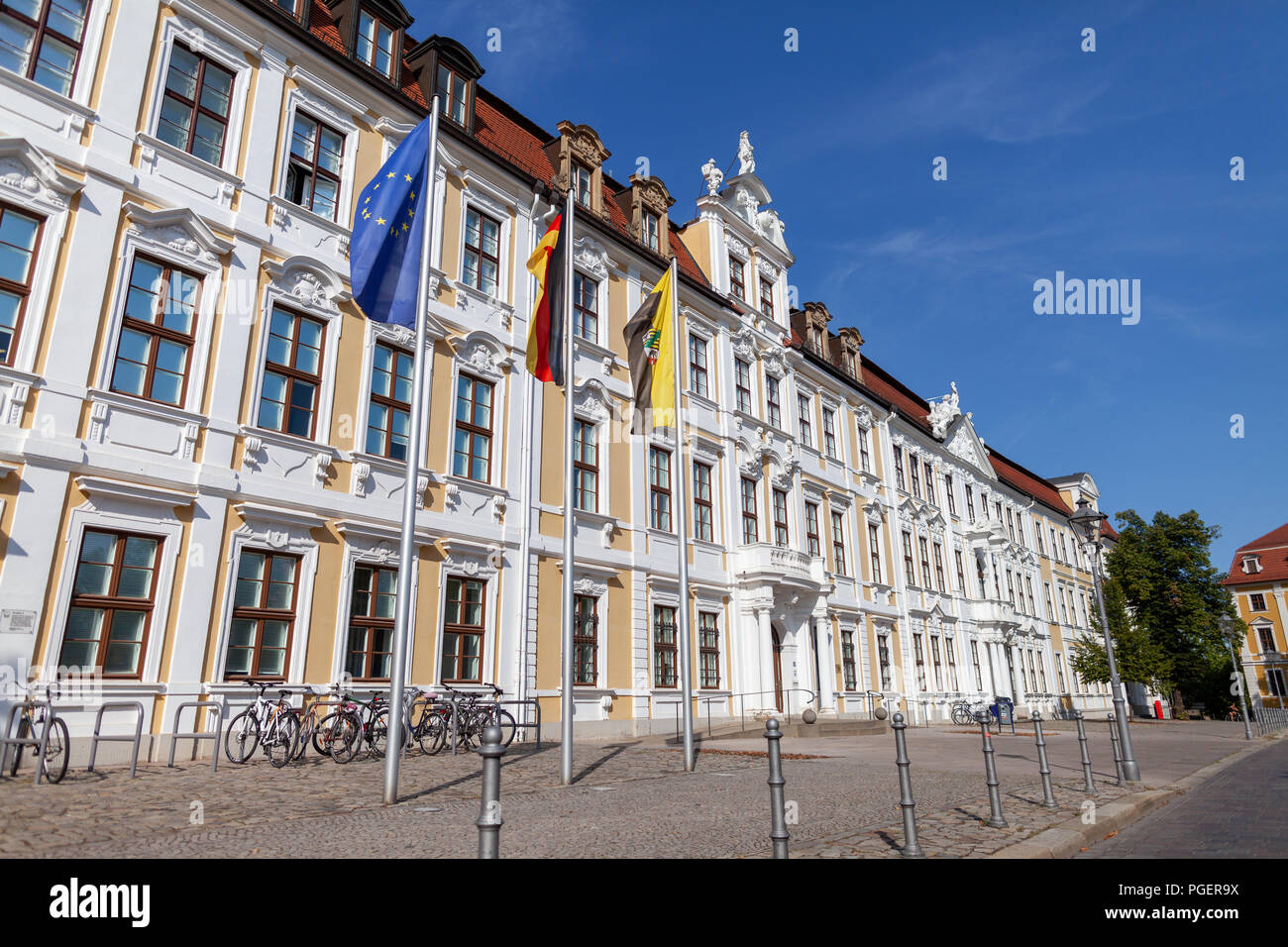 Europe, German and  Saxony-Anhalt flag in front of the state parliament in Magdeburg / Germany Stock Photo