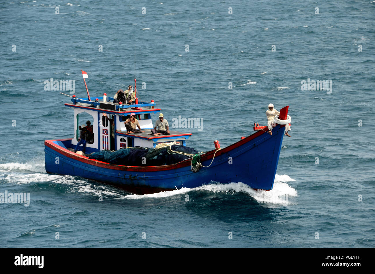 fishing motor boat and fishermen , Indonesian, Sumatra Stock Photo