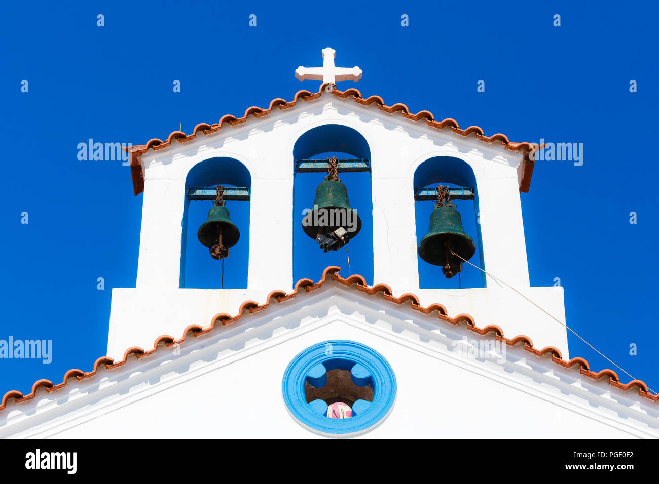Aghios Spyridon little white church architectural details on the small island of Elafonosos, Lakonia, Greece Stock Photo