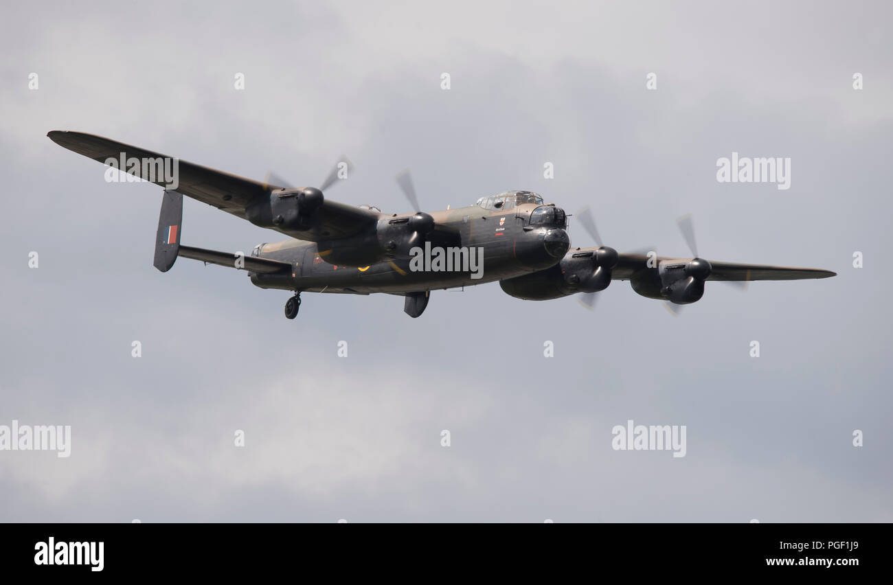 Surrey, UK. Avro Lancaster of the Battle of Britain Memorial Flight flying at 2018 Dunsfold