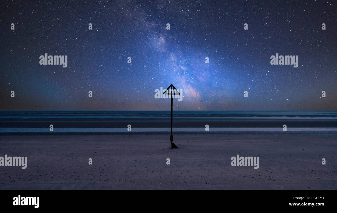 Stunning vibrant Milky Way composite image over landscape of beautiful ...