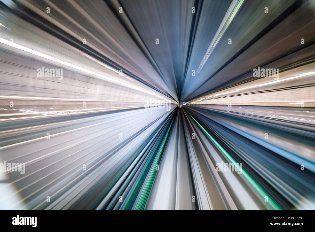 Motion blur of train moving inside tunnel in Tokyo, Japan Stock Photo