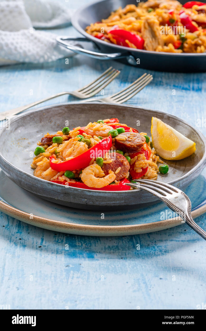Spanish paella with prawns, chicken, chorizo and red pepper Stock Photo