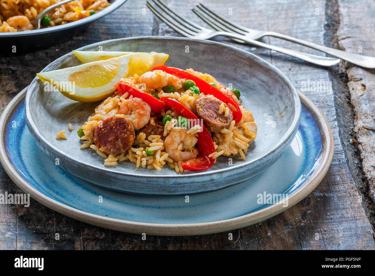 Spanish paella with prawns, chicken, chorizo and red pepper Stock Photo
