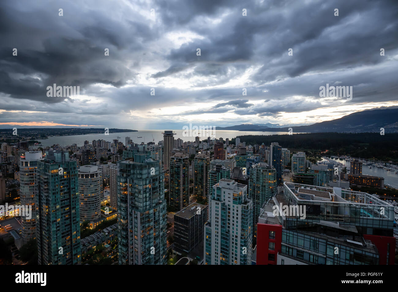 Aerial view of Downtown City during a stormy summer sunset. Taken in ...