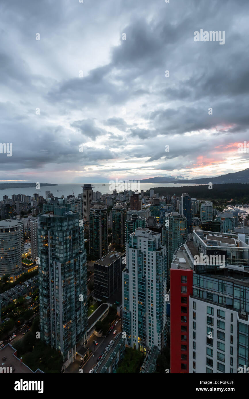 Aerial view of Downtown City during a stormy summer sunset. Taken in ...