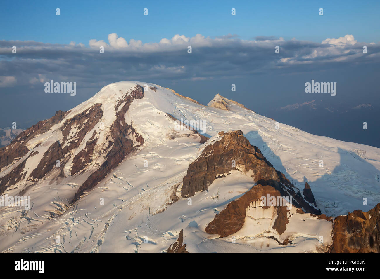 Aerial landscape view of the Mount Baker during a vibrant summer sunset. Located Northeast of