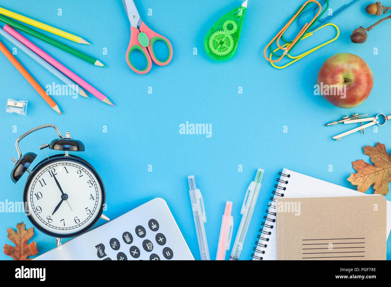 Creative flat lay top view back to school concept with alarm clock ...