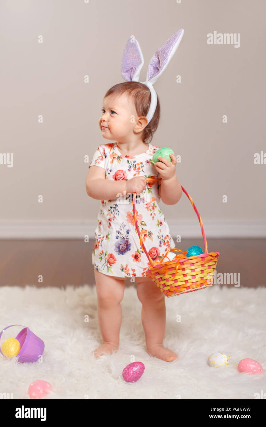 baby holding basket