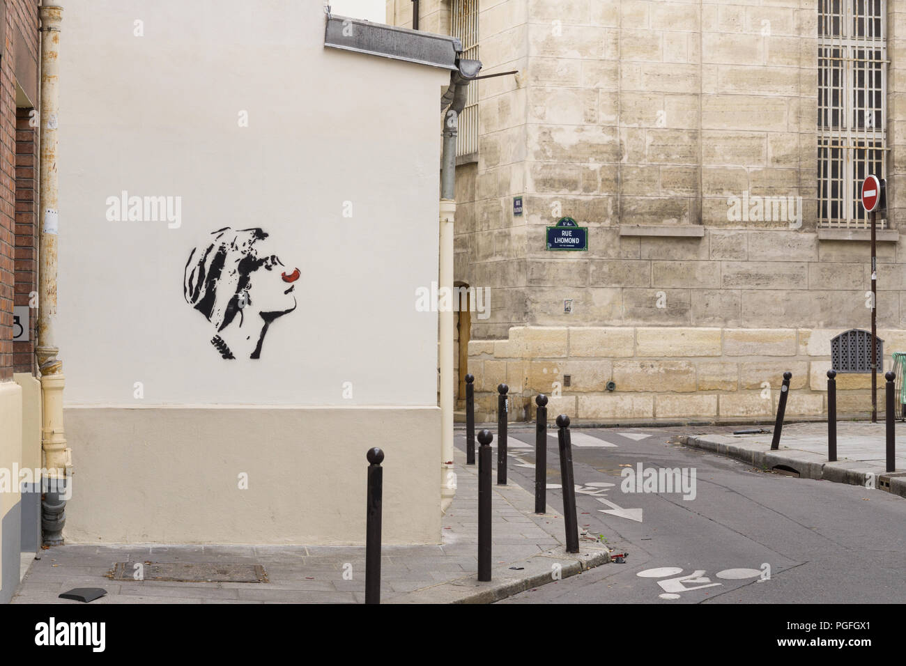 Street art Paris - Graffiti of a woman with comic red nose in the 5th arrondissement of Paris, France, Europe. Stock Photo