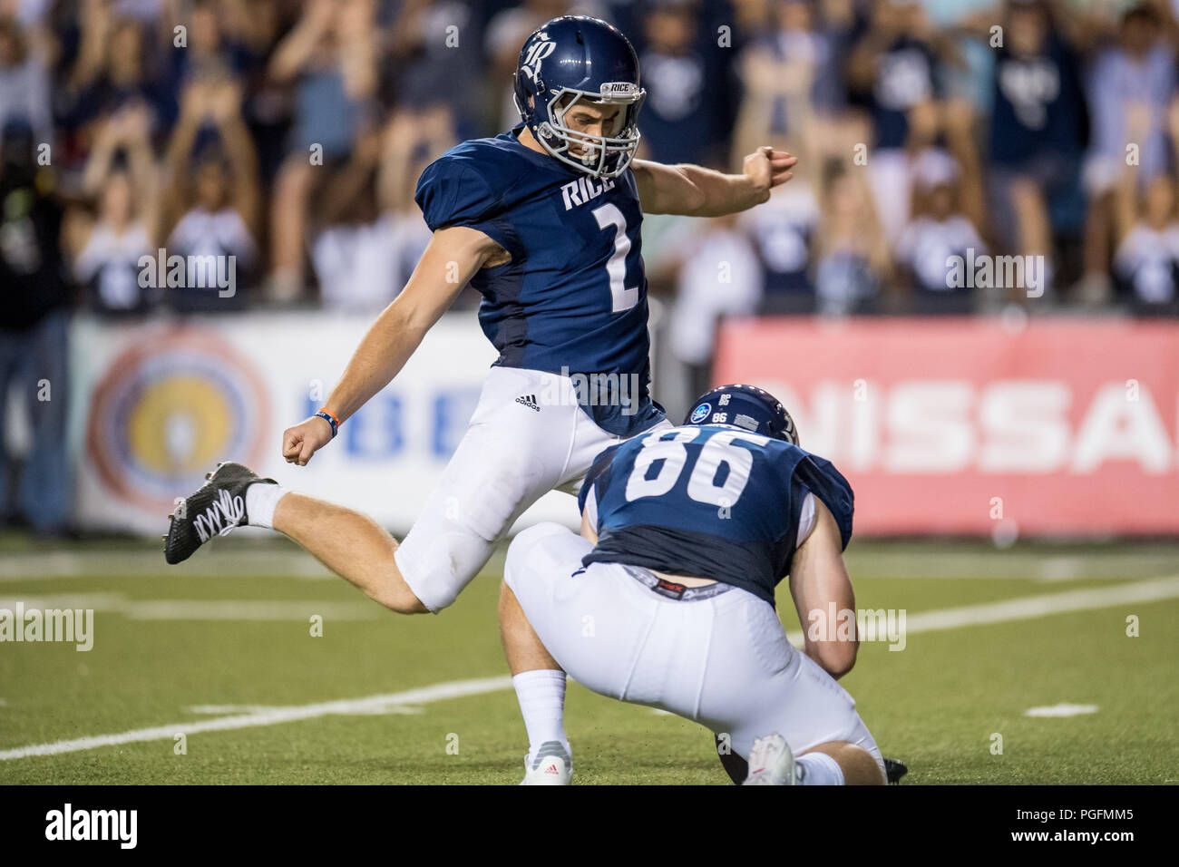 Houston, USA. 25 August 2018. Rice Owls place kicker Jack Fox (2) kicks ...