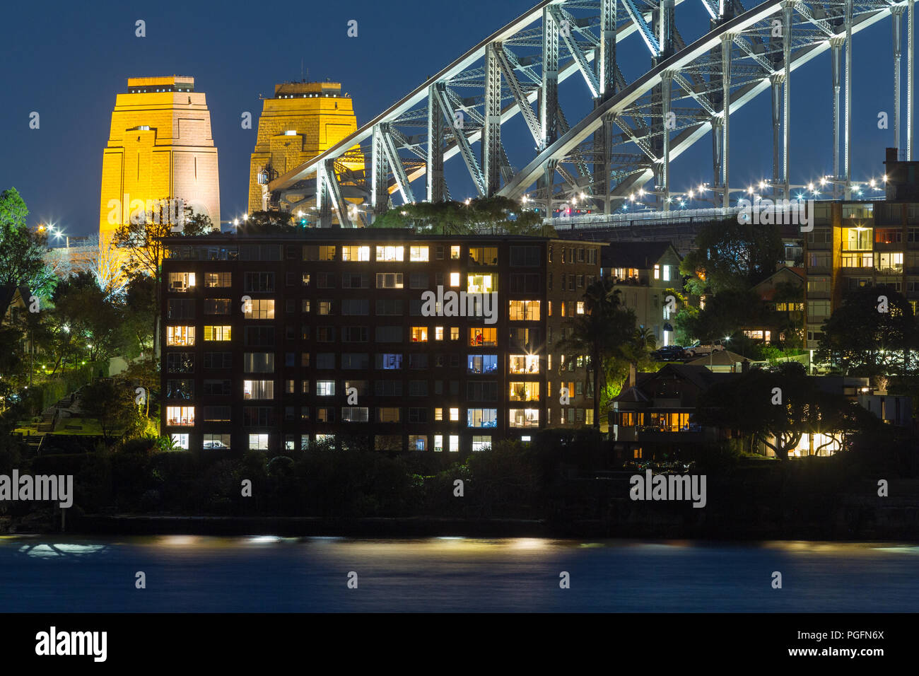 Sydney, Australia, has been ranked the second most expensive real estate market in the world, as of 2018, second only to Hong Kong in terms of affordability. With a population in excess of five million, Sydney contains over a fifth of Australia's total population. The city is ranked as one of the world's most liveable but expensive places.  One in four new houses in Sydney are now purchased by Chinese investors. Pictured: high-density Sydney housing on the shores of Sydney Harbour with Sydney Harbour Bridge seen in the background. Credit: Robert Wallace / Wallace Media Network/Alamy Live News Stock Photo