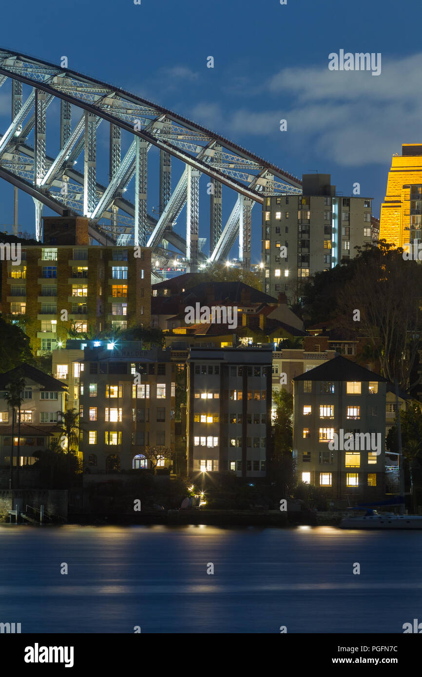 Sydney, Australia, has been ranked the second most expensive real estate market in the world, as of 2018, second only to Hong Kong in terms of affordability. With a population in excess of five million, Sydney contains over a fifth of Australia's total population. The city is ranked as one of the world's most liveable but expensive places.  One in four new houses in Sydney are now purchased by Chinese investors. Pictured: high-density Sydney housing on the shores of Sydney Harbour with Sydney Harbour Bridge seen in the background. Credit: Robert Wallace / Wallace Media Network/Alamy Live News Stock Photo