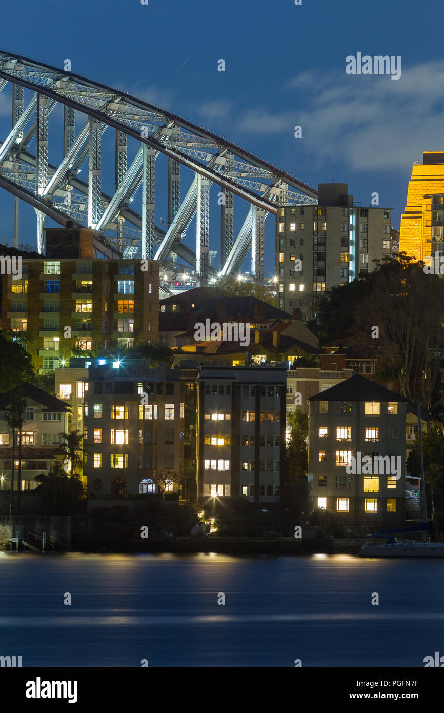 Sydney, Australia, has been ranked the second most expensive real estate market in the world, as of 2018, second only to Hong Kong in terms of affordability. With a population in excess of five million, Sydney contains over a fifth of Australia's total population. The city is ranked as one of the world's most liveable but expensive places.  One in four new houses in Sydney are now purchased by Chinese investors. Pictured: high-density Sydney housing on the shores of Sydney Harbour with Sydney Harbour Bridge seen in the background. Credit: Robert Wallace / Wallace Media Network/Alamy Live News Stock Photo