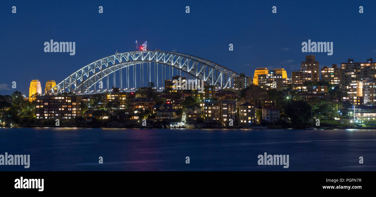 Sydney, Australia, has been ranked the second most expensive real estate market in the world, as of 2018, second only to Hong Kong in terms of affordability. With a population in excess of five million, Sydney contains over a fifth of Australia's total population. The city is ranked as one of the world's most liveable but expensive places.  One in four new houses in Sydney are now purchased by Chinese investors. Pictured: high-density Sydney housing on the shores of Sydney Harbour with Sydney Harbour Bridge seen in the background. Credit: Robert Wallace / Wallace Media Network/Alamy Live News Stock Photo