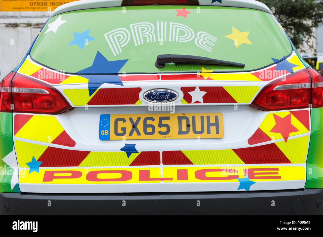 Hastings, East Sussex, UK. 26th Aug, 2018. Hastings pride and festival parade celebrates diversity in this seaside town on the south east coast. This years theme is no discrimination, no alienation. The event runs from 11am until late in the evening. Police car shows support with rainbow pride colours. Police pride. © Paul Lawrenson 2018, Photo Credit: Paul Lawrenson / Alamy Live News Stock Photo