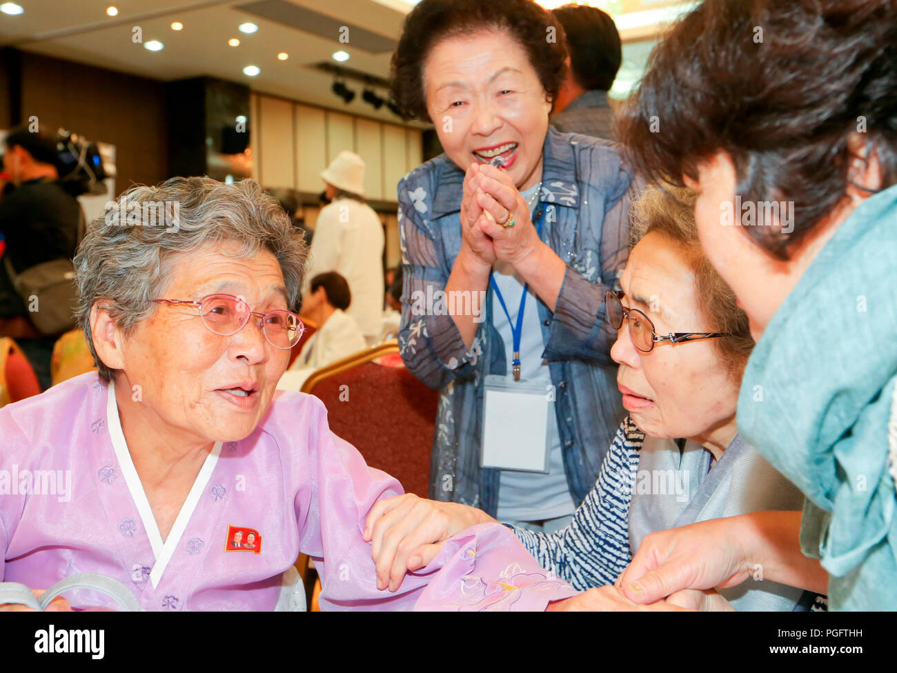Inter-Korean Family Reunion, Aug 24, 2018 : North Korean Ryang Cha-Ok (L, 82) meets her South Korean sisters during their family reunion at Kumgangsan hotel in Mt. Kumgang resort, North Korea in this picture taken by Joint Press Corps at Mt. Kumgang and handouted by the South Korean Ministry of Unification. A total of 326 South Korean people from 81 families crossed the Demilitarized Zone separating the two Koreas on August 24 to meet their North Korean family members for the first time since they were mostly separated by the 1950-53 Korean War, during a three-day inter-Korean family reunion u Stock Photo