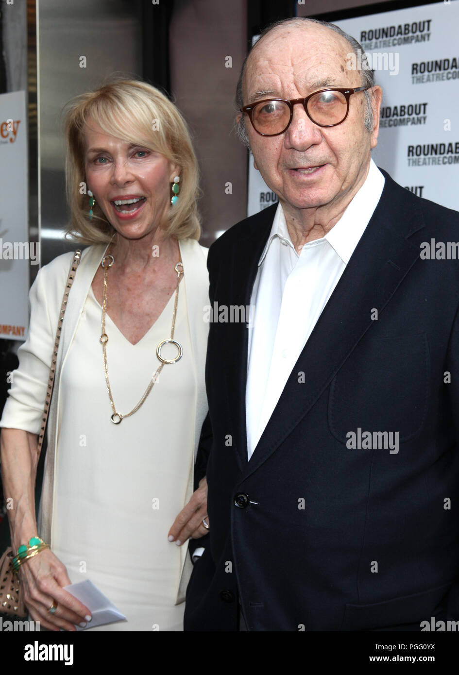 ***FILE PHOTO*** Neil Simon Has passed Away At The Age of 91 Neil Simon with wife Elaine Joyce pictured at the Opening Night Arrivals of 'Harvey' at Studio 54 New York City June 14, 2012 © Walter McBride/WM Photography . Credit: Walter McBride/MediaPunch Stock Photo