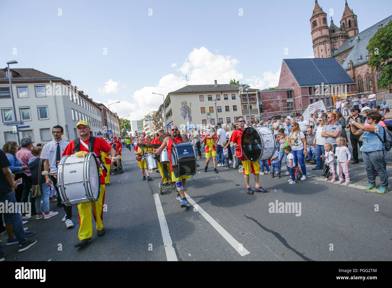 Worms, Germany. 26th August 2018. Members of the Pfalzer-Rhythmusfetzer Landstuhl Guggenmusik band perform in the parade. The first highlight of the 2018 Backfischfest was the big parade through the city of Worms with over 70 groups and floats. Community groups, music groups and businesses from Worms and further afield took part. Credit: Michael Debets/Alamy Live News Stock Photo
