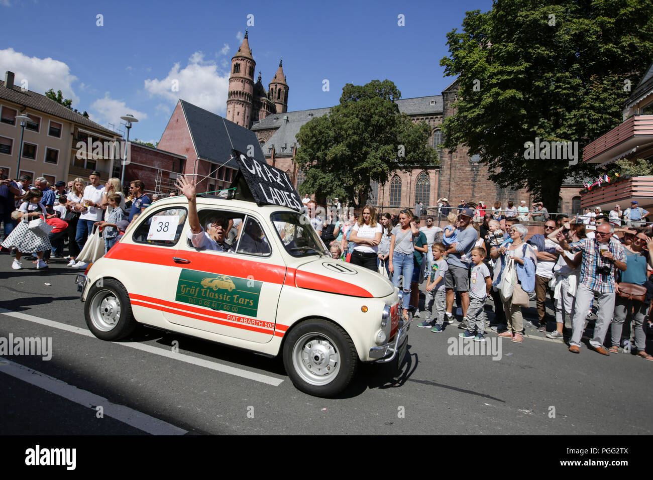 Worms, Germany. 26th August 2018. A Fiat Abarth 500 vintage car partakes in the parade. The first highlight of the 2018 Backfischfest was the big parade through the city of Worms with over 70 groups and floats. Community groups, music groups and businesses from Worms and further afield took part. Credit: Michael Debets/Alamy Live News Stock Photo