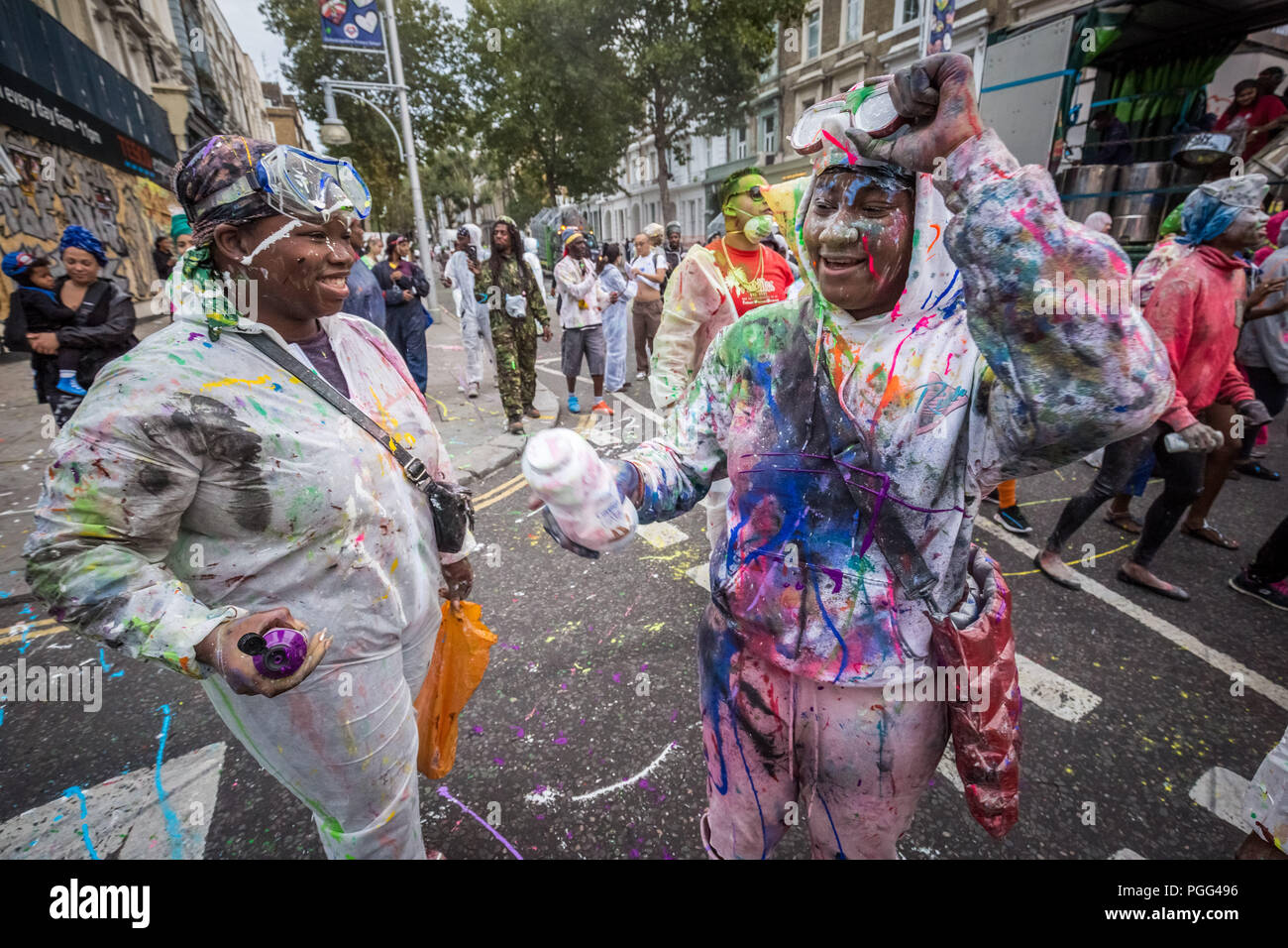 London, UK. 26th August 2018. Jouvert parade starts the Notting Hill Carnival 2018 festivities with the traditional ‘dirty’ paint, oil and coloured powder being thrown to the sounds of African drums and rhythm bands. Credit: Guy Corbishley / Alamy Live News Stock Photo
