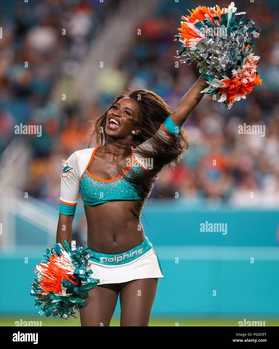 Miami Dolphins cheerleader performs during pre game wearing a festive  uniform at Dolphin Stadium in Miami on December 14, 2008. The Dolphins  defeated the 49ers 14-9. (UPI Photo/Michael Bush Stock Photo - Alamy