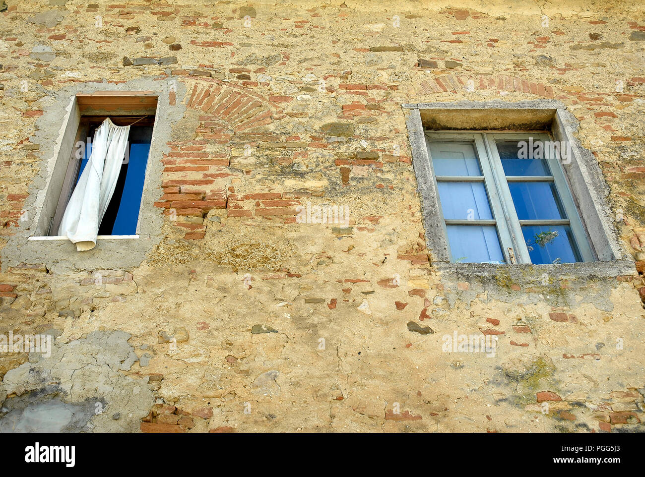 Old windows of a farmhouse in Tuscany,Italy. Stock Photo