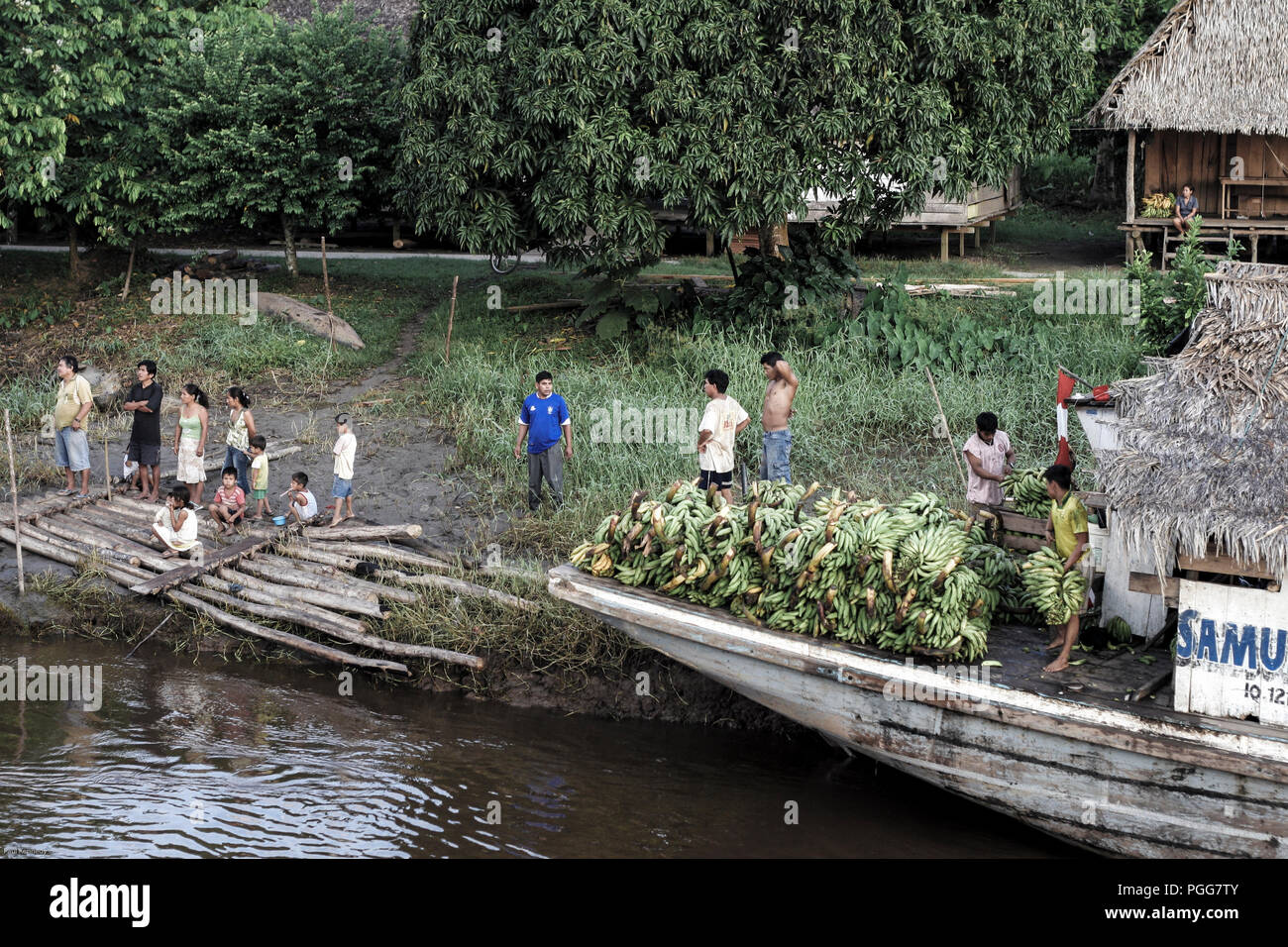 Riverboat unloading fruit and vegetables at Lagunas in the Amazon jungle in Loreto, Peru Stock Photo