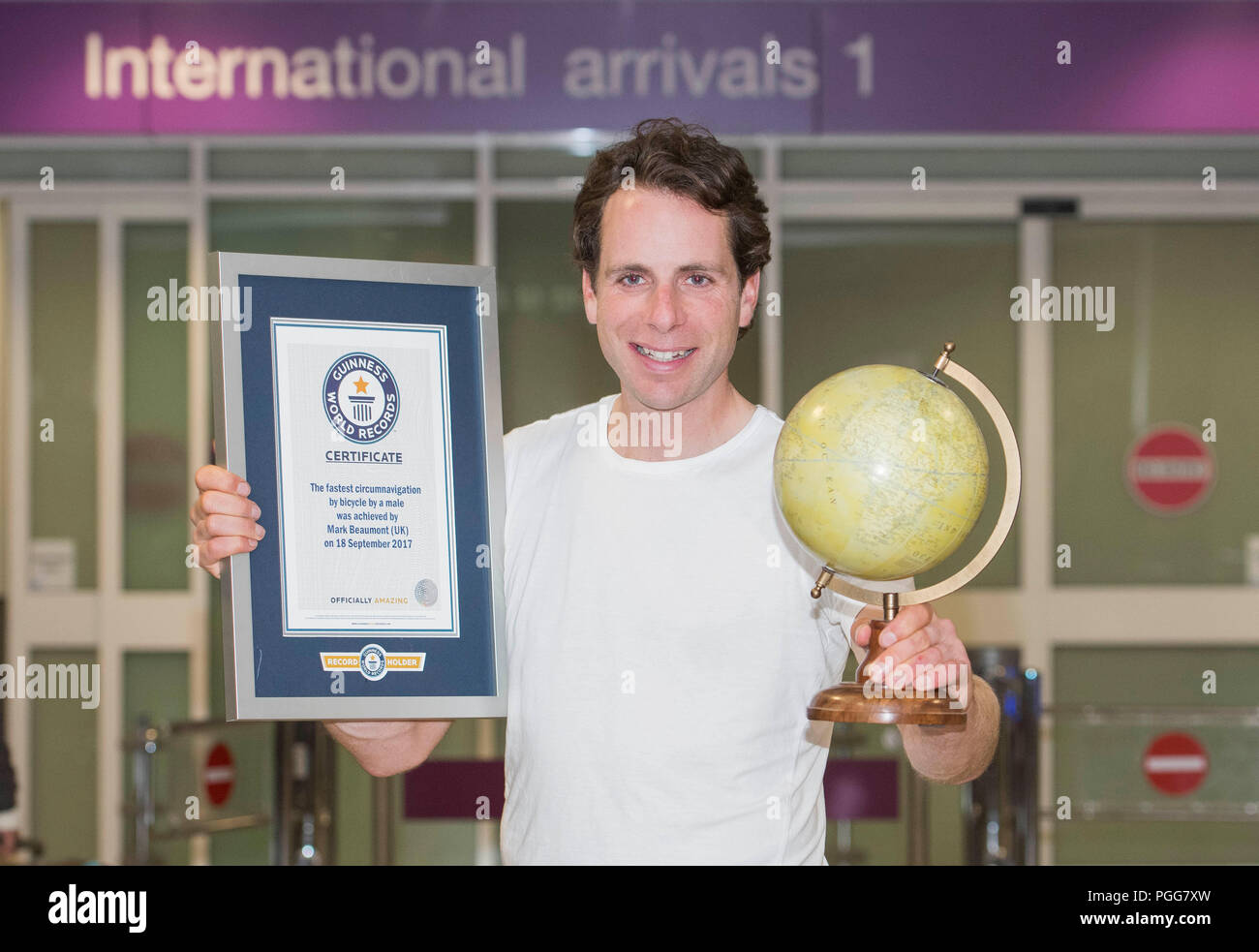 Picture: Ultra-endurance athlete Mark Beaumont Returns to Edinburgh Airport after he has cycled around Stock Photo