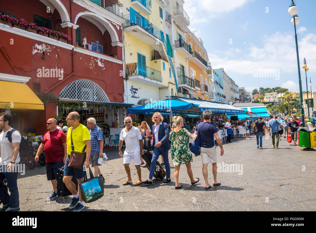 Tourists walking Marina Grande, port, Capri Island, Italy, high summer ...