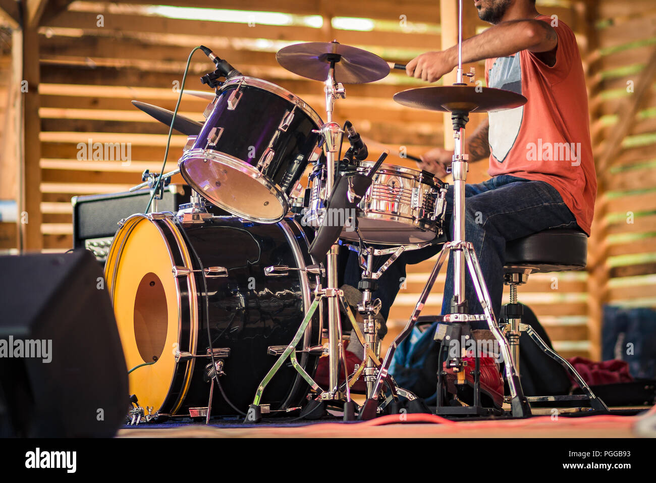 Drummer performing on stage Stock Photo - Alamy