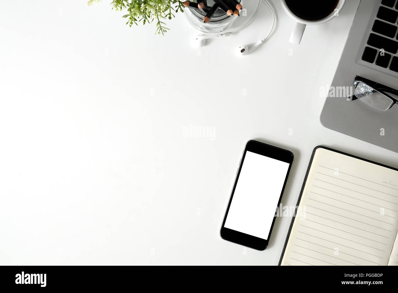 Download Mockup Smartphone On Office Desk With Laptop And Notebook Paper Copy Space Mockup Mobile Phone With Top View Stock Photo Alamy PSD Mockup Templates