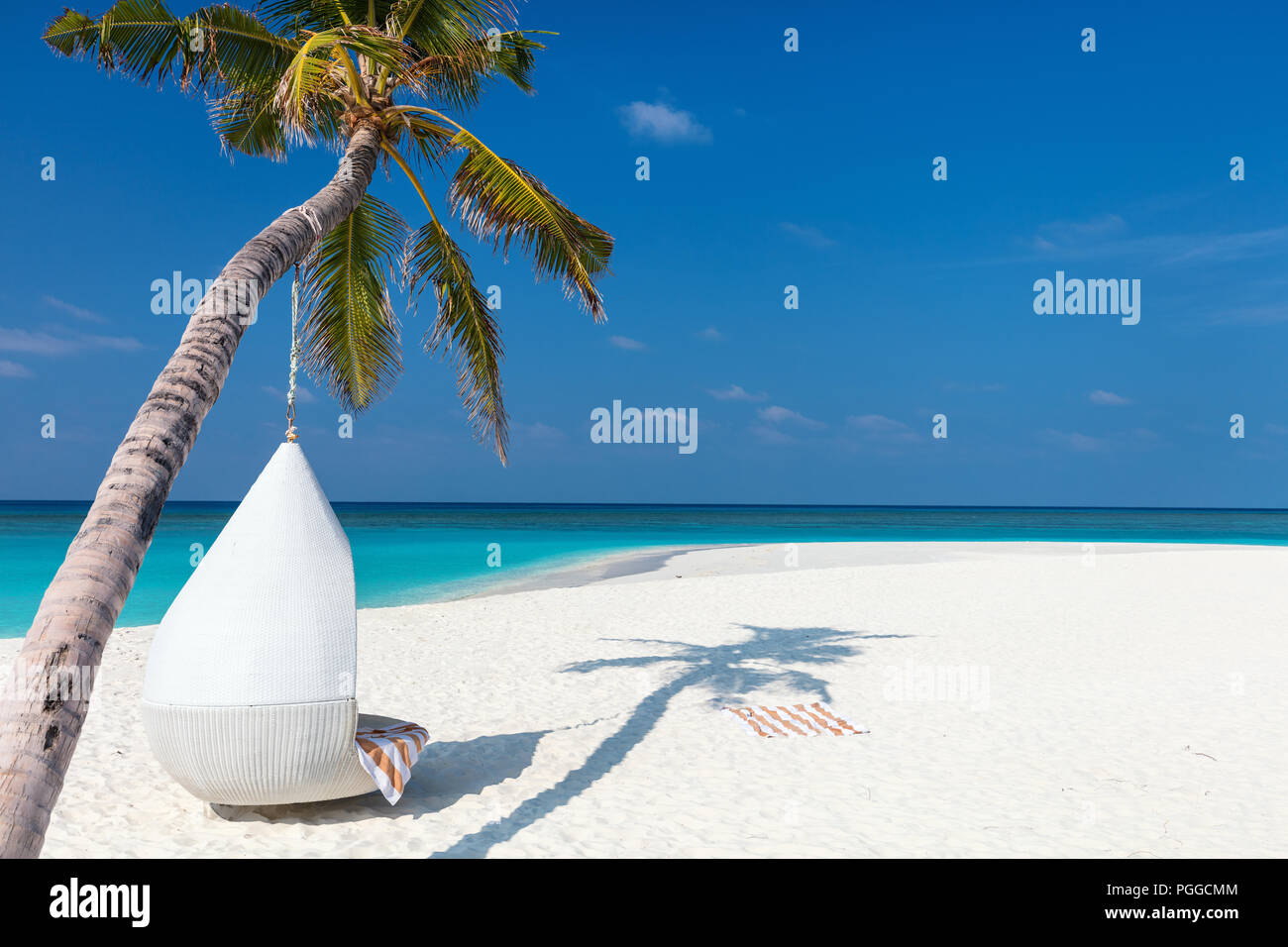 Perfect tropical white sand beach with coconut palms Stock Photo