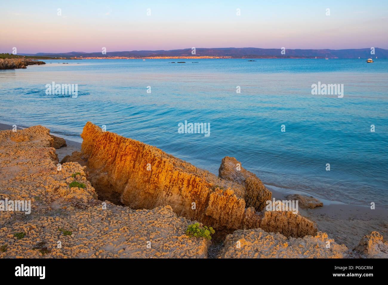 Alghero, Sardinia / Italy - 2018/08/11: Panoramic view of the Spiaggia di Lazzaretto beach at the Gulf of Alghero in the Porto Conte Regional Park Stock Photo