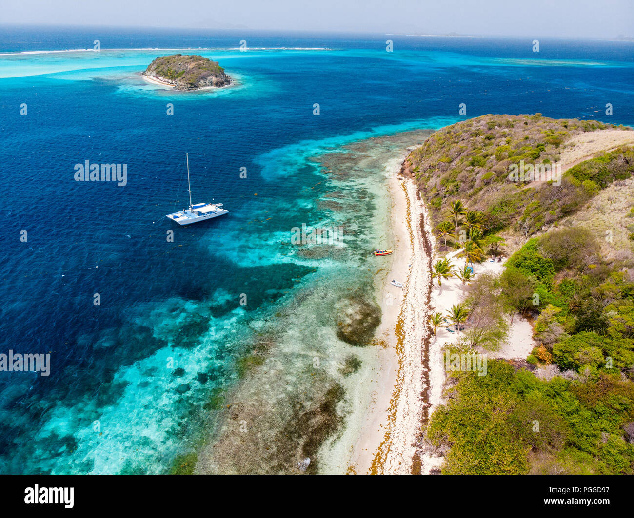 Aerial drone view of tropical islands and turquoise Caribbean sea of Tobago cays in St Vincent and Grenadines Stock Photo