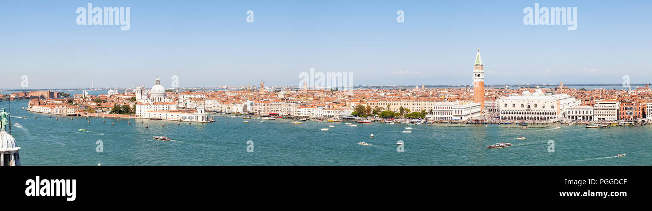 Panorama aerial rooftop cityscape of Venice, Veneto, Italy. Bacino San Marco, Doges Palace, Campanile, Punta della Dogana, Basilica Santa Maria della  Stock Photo