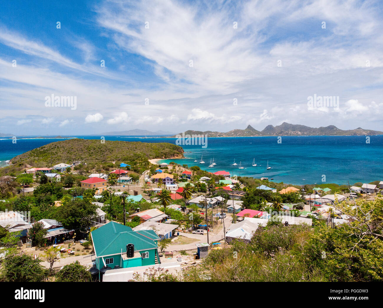 Aerial drone view of tropical island of Mayreau and turquoise Caribbean sea in St Vincent and Grenadines Stock Photo