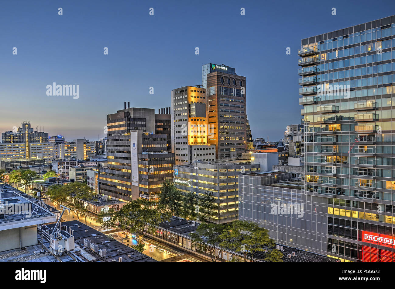 Rotterdam, The Netherlands, September 28, 2016: the Lijnbaan area, with it's pedestrian shopping street surrounded by modern highrise, during the blue Stock Photo